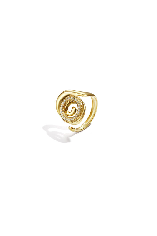 Bague imposante en forme de coquillage spirale ornée de pierres